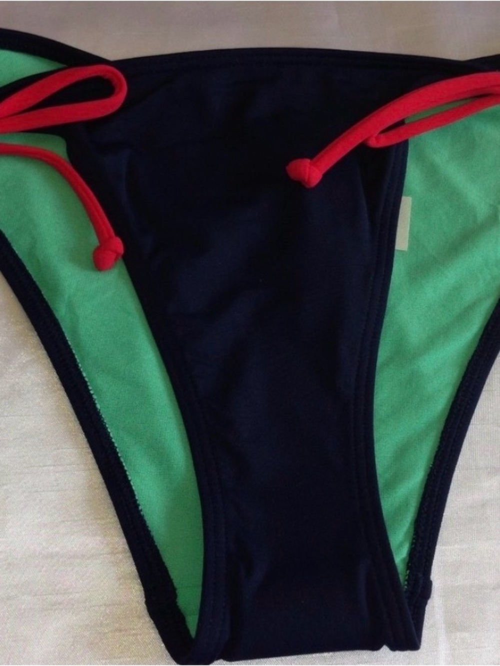 Hollister Navy Bikini Bottom with Mint Lining and Red Side Ties size XS